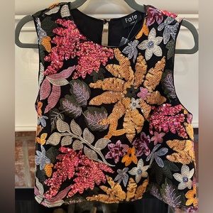 Multi-floral and color sequin blouse.